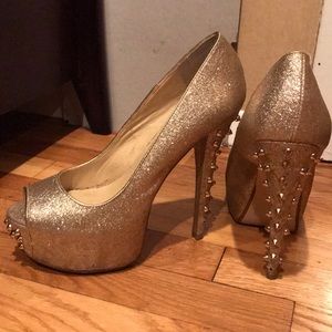 Gold stilettos with spikes